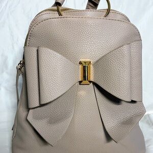 Crossi Embossed Bow Front backpack vegan leather taupe NWOT